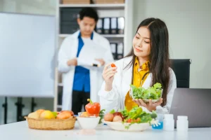 Pain specialist at Augusta Pain Center reviewing anti-inflammatory nutrition options to support chronic pain and inflammation management.